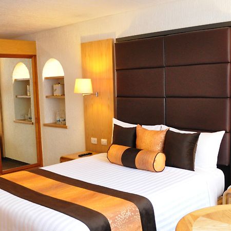 Hotel Royal Pedregal Ciudad de México Exteriér fotografie A bedroom at the hotel